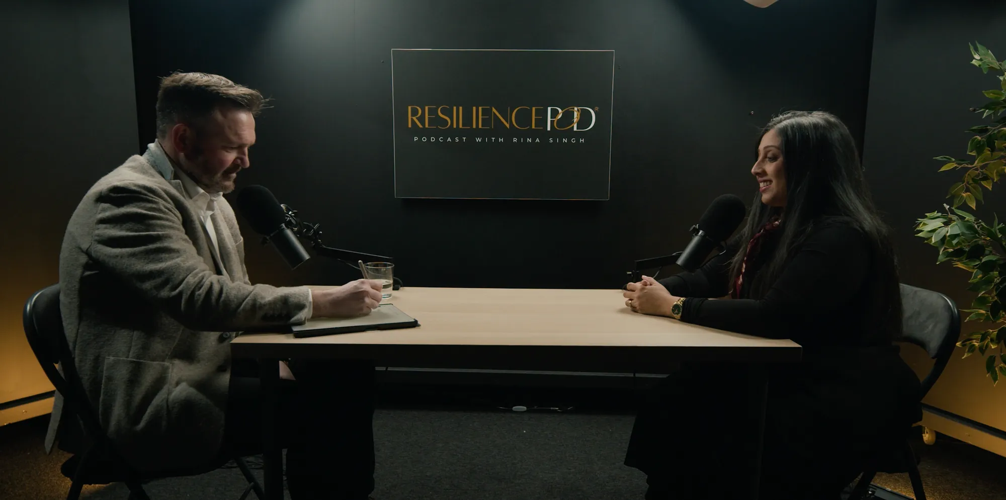 Two presenters recording in The Black Out